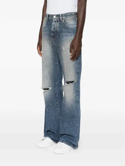 撕裂效果膝部微喇牛仔裤