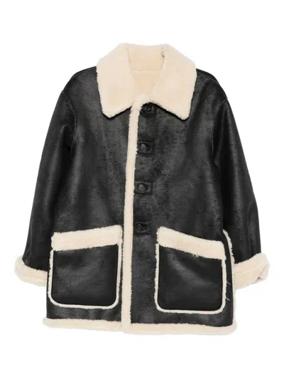Dunst Reversible Unisex Shearling Jacket In Black