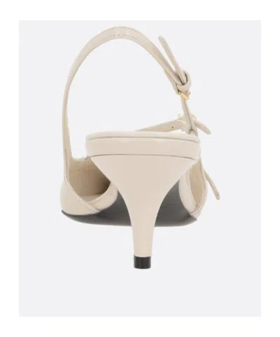 Miu Miu Buckled Patent Slingback Pumps In Neutral