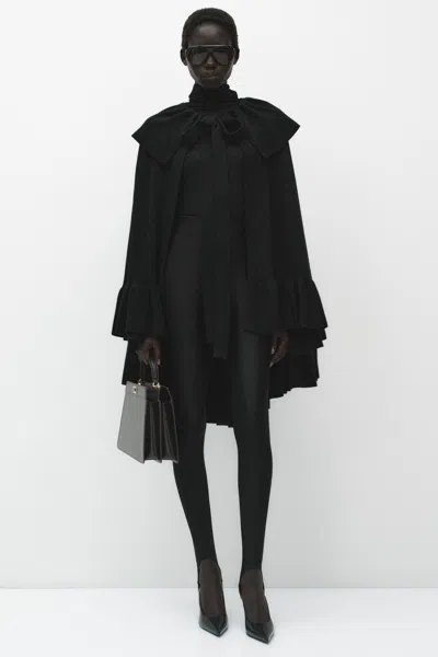Arakii Knitted Ruffle Cape In Black