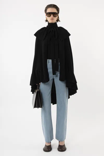 Arakii Knitted Ruffle Cape In Black
