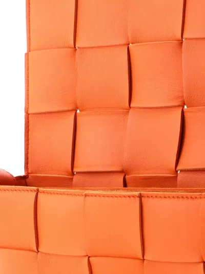 Pre-owned Bottega Veneta Cassette Maxi Intrecciato Leather Small Crossbody Bag In Orange