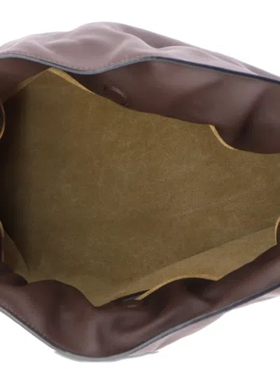 Pre-owned Loewe Flamenco Knot Leather Medium Clutch Bag In Brown