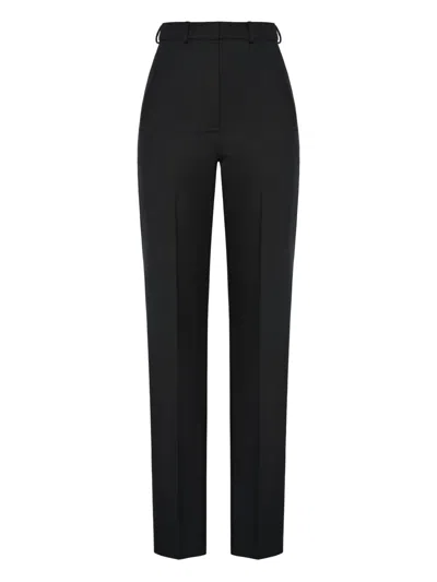 Anouki Pressed-crease Trousers In Black