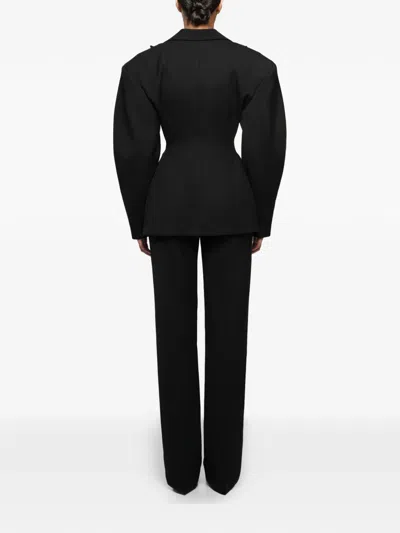 Anouki Pressed-crease Trousers In Black