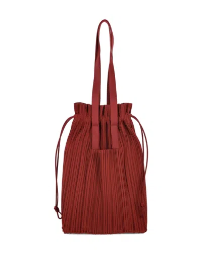 Issey Miyake Pleated Drawstring Tote Bag In Brown