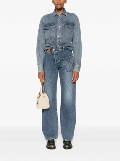 Jw Anderson Twisted-effect Logo-patch Denim Jeans In Blue