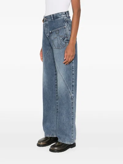 Jw Anderson Twisted-effect Logo-patch Denim Jeans In Blue