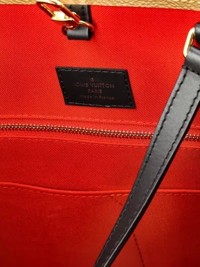 Pre-owned Louis Vuitton Onthego Reverse Monogram Giant Gm Tote Bag In Brown
