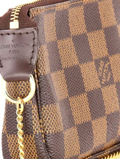 Pre-owned Louis Vuitton Pochette Accessoires Limited Edition Damier Mini Clutch Bag In Brown