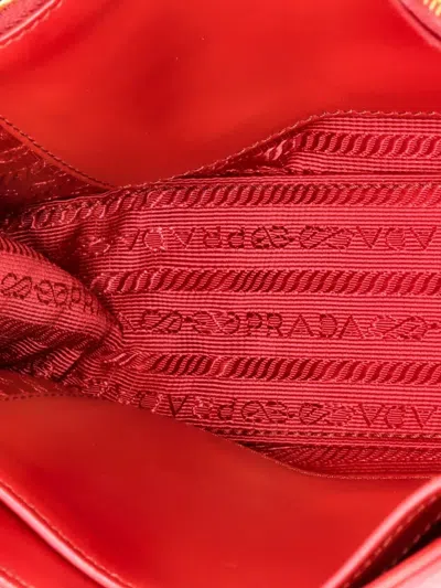 Pre-owned Prada Curved Flap Chain Diagramme Quilted Leather Small Shoulder Bag In Red