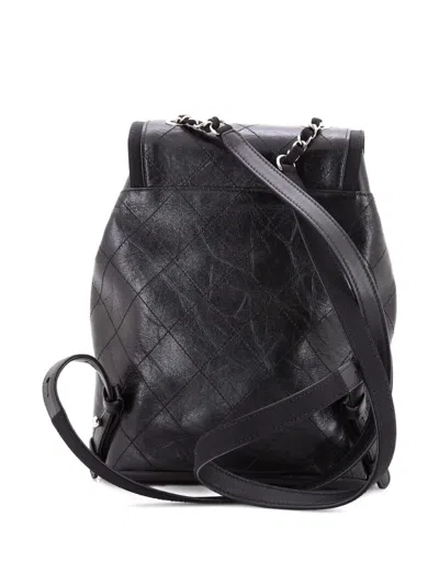 Pre-owned Chanel Drawstring Cc Flap Quilted Aged Calfskin And Grosgrain Small Backpack In Black