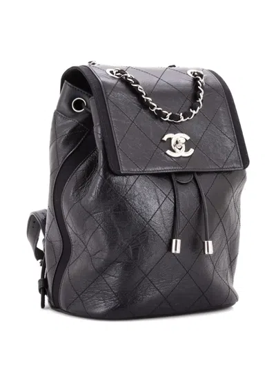 Pre-owned Chanel Drawstring Cc Flap Quilted Aged Calfskin And Grosgrain Small Backpack In Black