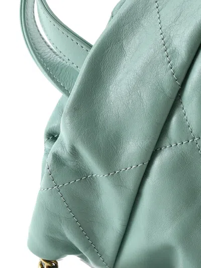 Pre-owned Chanel 22 Chain Quilted Calfskin Medium Backpack In Green