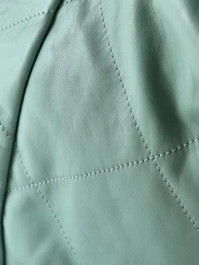 Pre-owned Chanel 22 Chain Quilted Calfskin Medium Backpack In Green