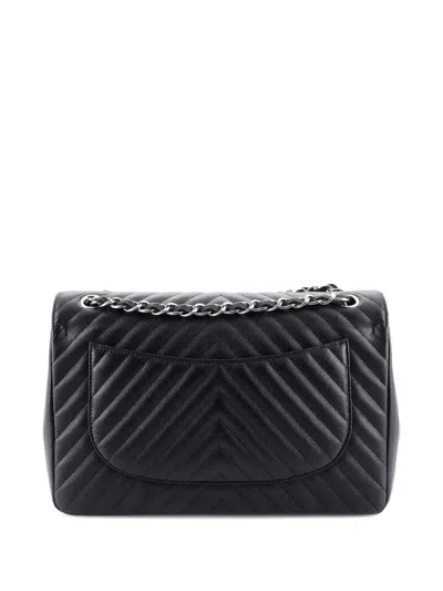 Pre-owned Chanel Classic Double Flap Bag Chevron Caviar Jumbo Shoulder Bag In Black