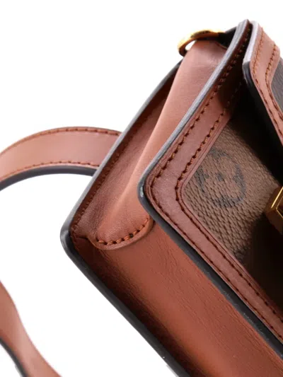 Pre-owned Louis Vuitton Dauphine Bumbag Reverse Monogram Canvas Bb Belt Bag In Brown
