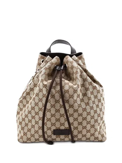 Pre-owned Gucci Drawstring Gg Canvas Medium Backpack In Brown