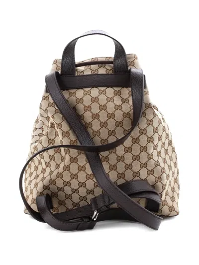 Pre-owned Gucci Drawstring Gg Canvas Medium Backpack In Brown