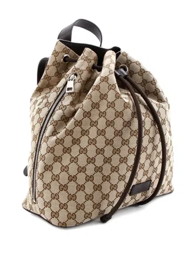 Pre-owned Gucci Drawstring Gg Canvas Medium Backpack In Brown