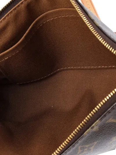 Pre-owned Louis Vuitton Pochette Accessoires Nm Monogram Canvas Clutch Bag In Brown