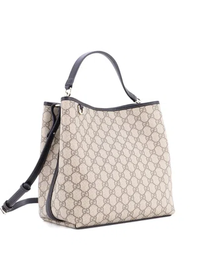 Pre-owned Gucci Gg Emblem Gg Coated Canvas Medium Bucket Bag In Brown