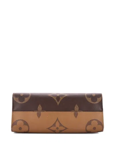 Pre-owned Louis Vuitton Onthego Reverse Monogram Giant Mm Tote Bag In Brown