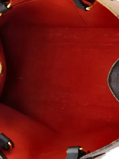 Pre-owned Louis Vuitton Onthego Reverse Monogram Giant Mm Tote Bag In Brown