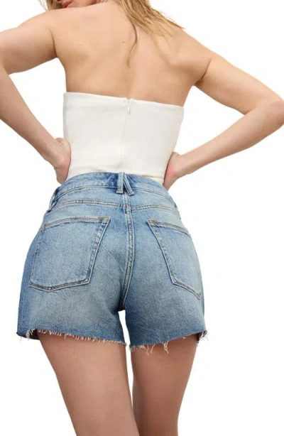 Good American Good Girlfriend Raw Hem Crossover Waist Denim Shorts