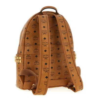 Mcm Small Medium Backpack With Front Pocket And Straps In Brown