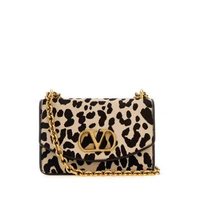Valentino Garavani Vain Small Cow-print Leather And Calf-hair Shoulder Bag In Brown