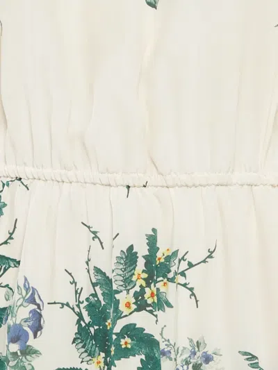 Pre-owned Sandro Floral-print Ruffled Mini Dress In Green