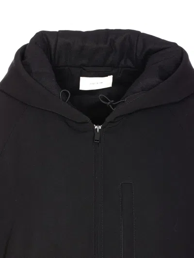 The Row Zip-up Hooded Coat In Black