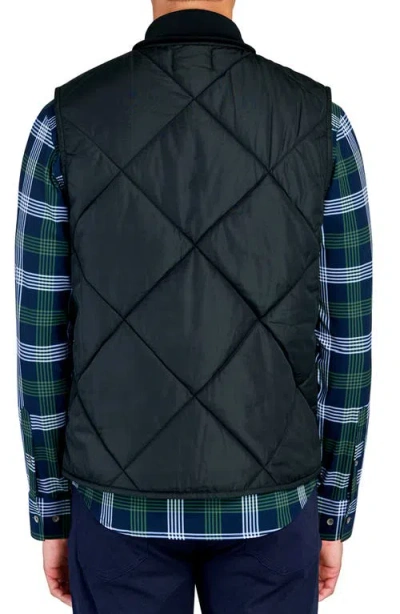 Wrk W.r.k Solid Quilted Vest In Black