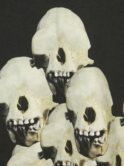 Pre-owned Givenchy Skull-print Polo Shirt In Black