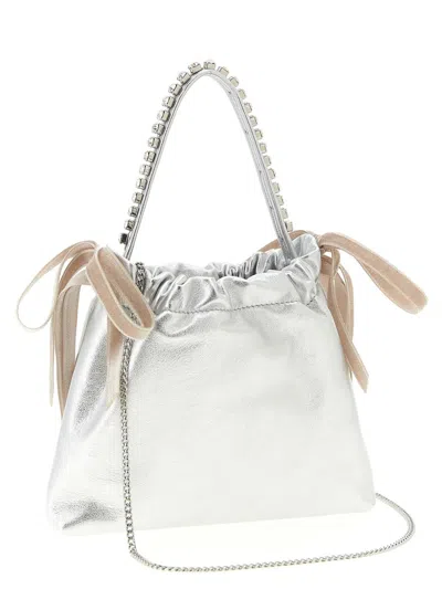 Jimmy Choo Drawstring Mini Hand Bags Pink In Silver