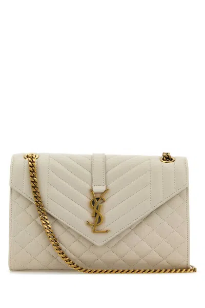 Saint Laurent Handbags. In White