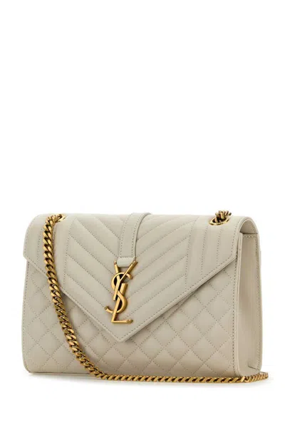 Saint Laurent Handbags. In White