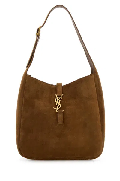 Saint Laurent Handbags. In Brown