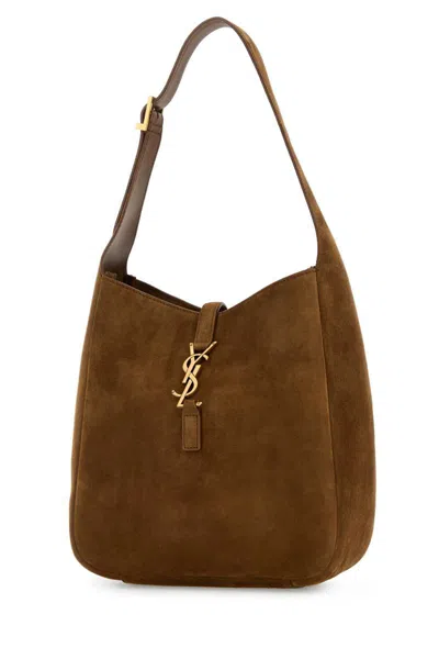 Saint Laurent Handbags. In Brown