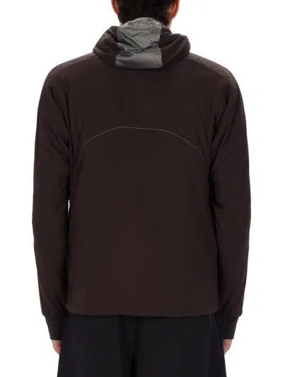 And Wander Hooded Jacket With Long Sleeves And Reflective Accents In Animal Print