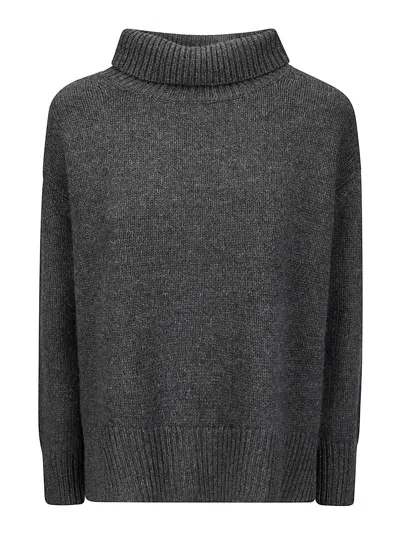 Be You Soft Cashmere Turtleneck Sweater With Side Slits And Relaxed Fit In Black