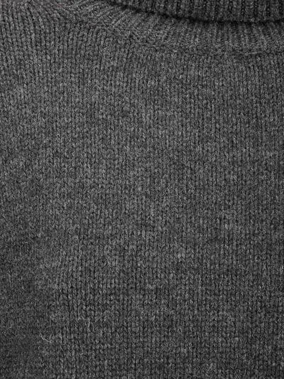 Be You Soft Cashmere Turtleneck Sweater With Side Slits And Relaxed Fit In Black