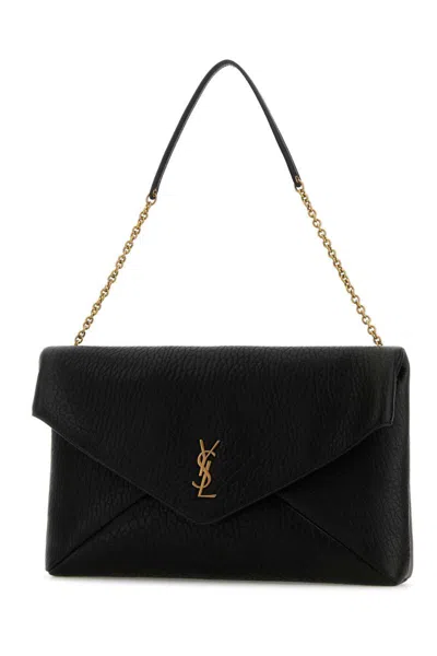 Saint Laurent Handbags. In Black