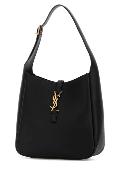 Saint Laurent Handbags. In Black