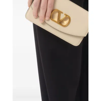 Valentino Garavani Vain Small Leather Clutch In White