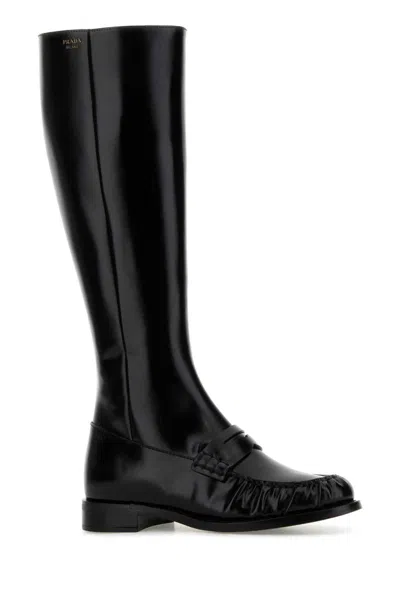 Prada Knee-high Leather Boots Glossy Finish In Black
