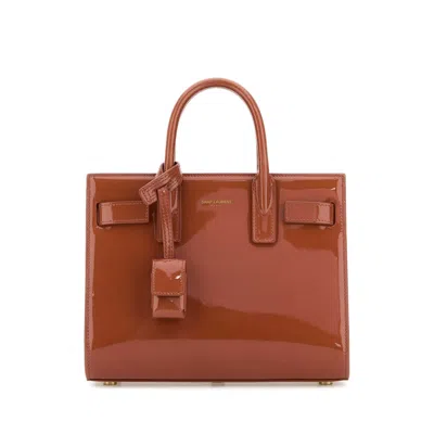 Saint Laurent Brick Leather Nano Sac De Jour Handbag In Brown