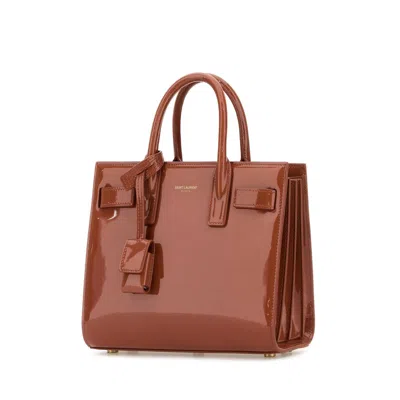 Saint Laurent Brick Leather Nano Sac De Jour Handbag In Brown