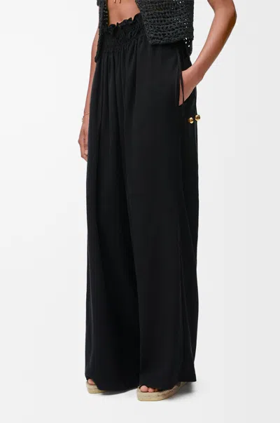 Loewe Trousers In Lyocell In Black